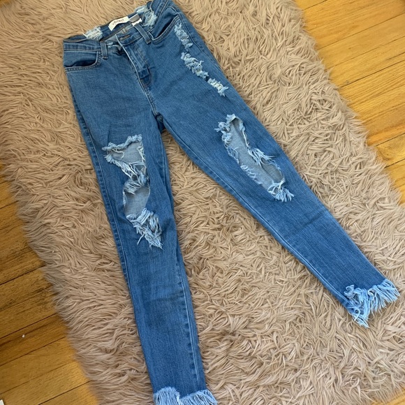 High-waisted Ripped Jeans - Picture 2 of 4